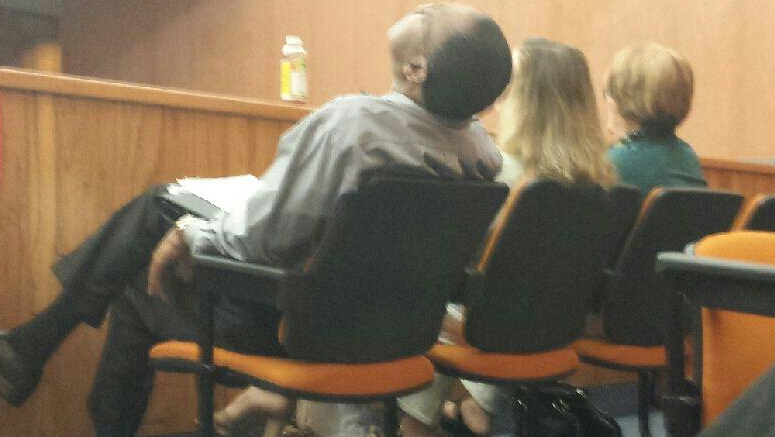 George in court with his wife and mistress. This is how he will look when he gets a guilty plea in civil court. What would you do if everyone is there that you hurt?  