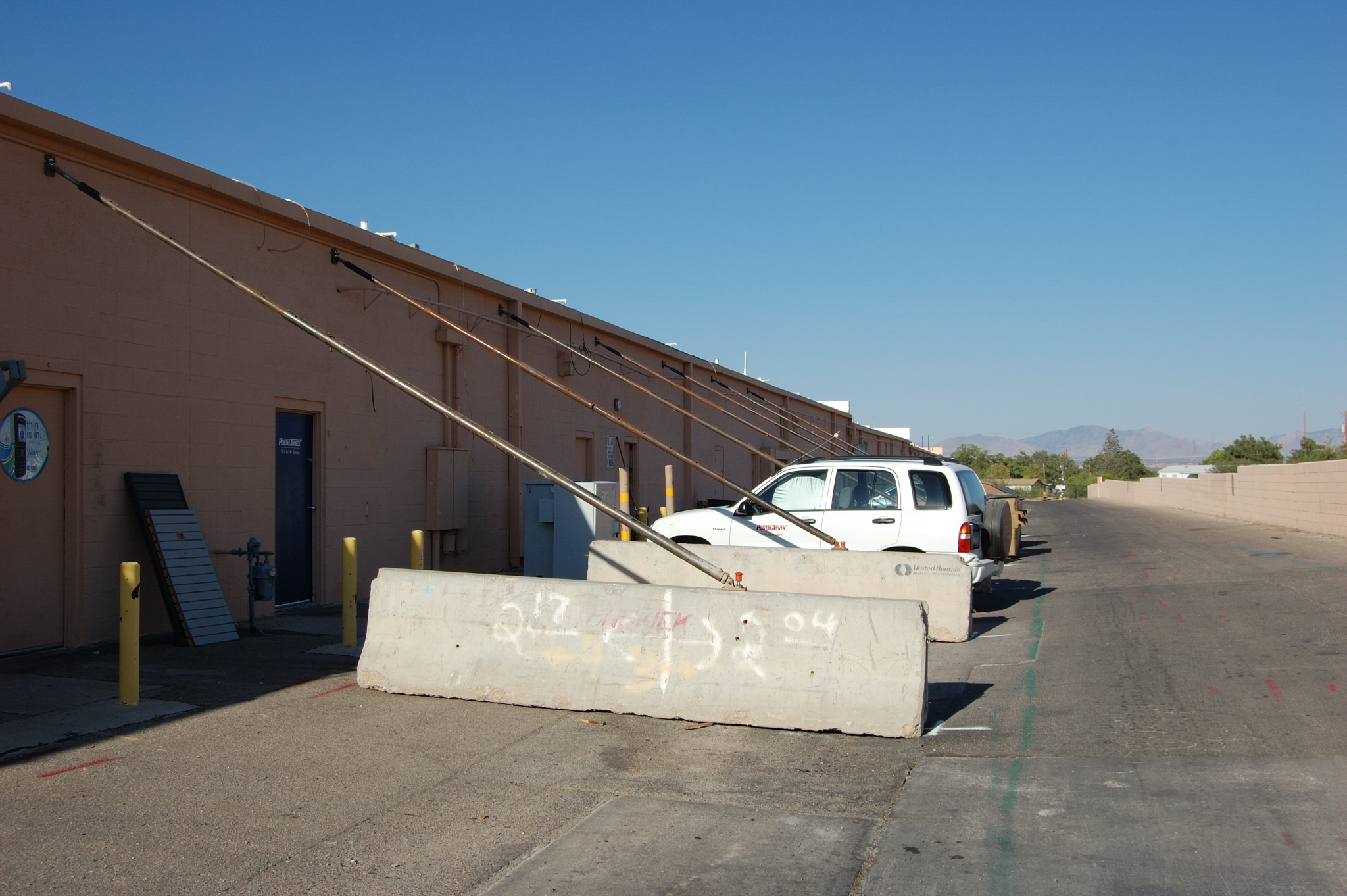 Poles holding up building