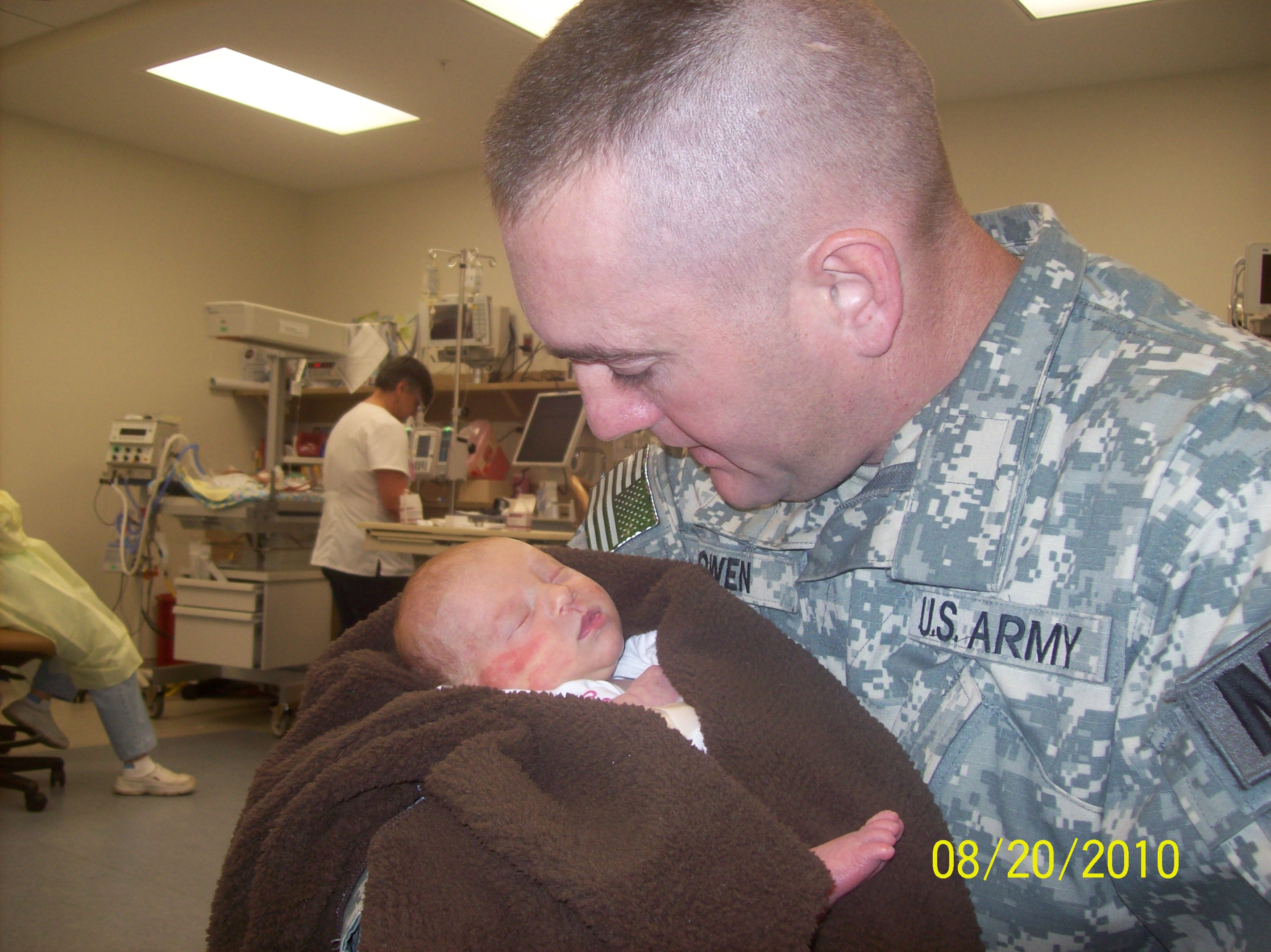 Our SOLDIER meeting his week old daughter for the first time