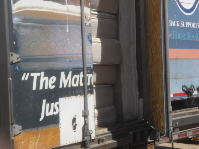 40 foot trailers STUFFED FULL of old stained dirty mattresses