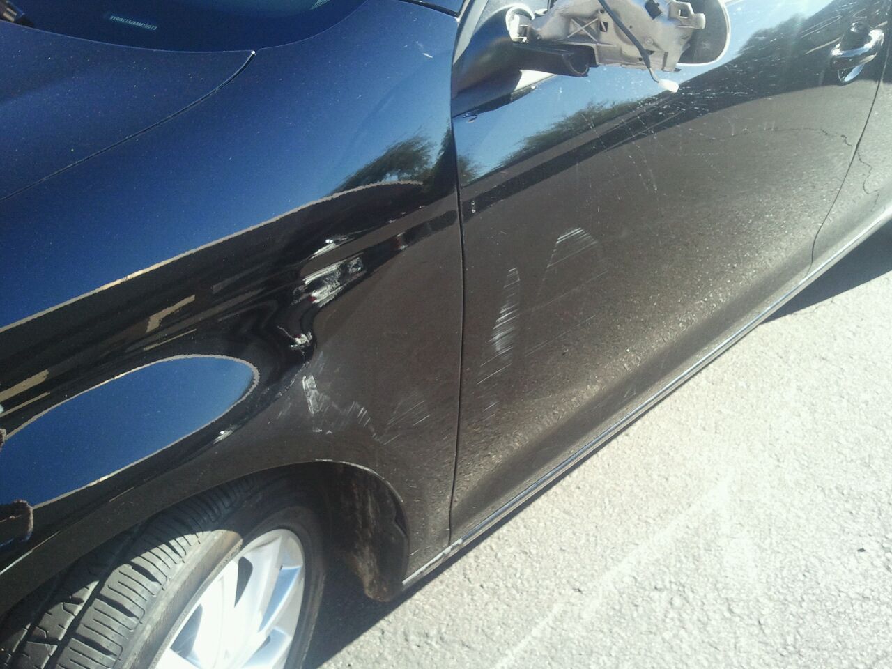 Damage to my car and mirror gone