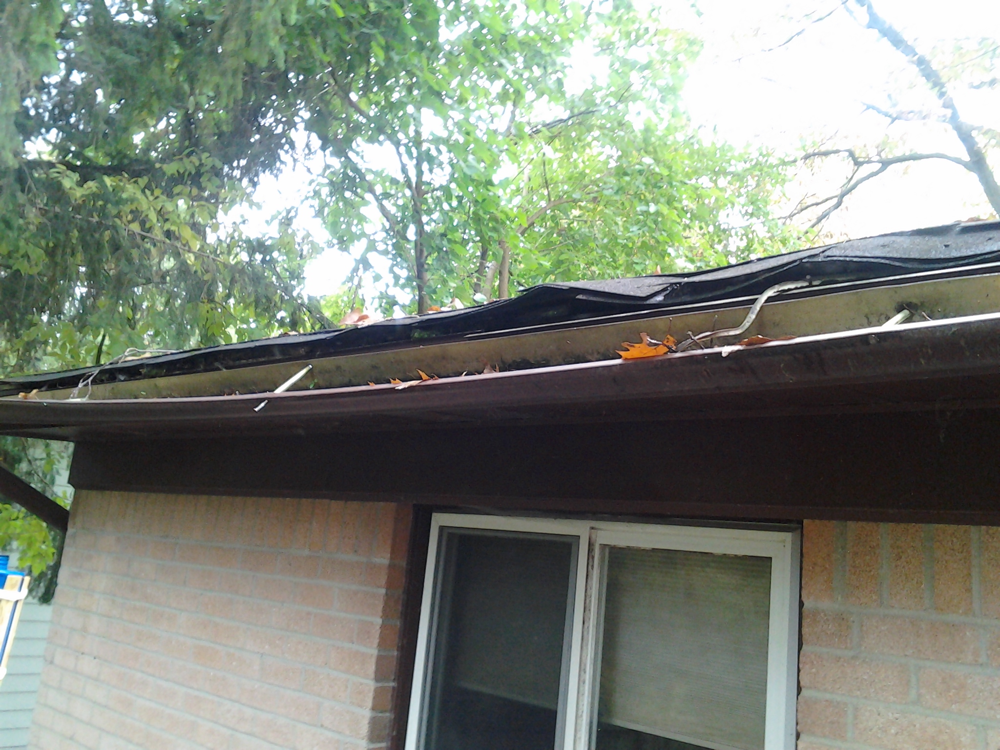This is what the gutters looked like BEFORE we started work that we were accused of knocking off.