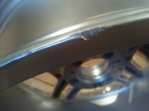 Damaged on lip of rim