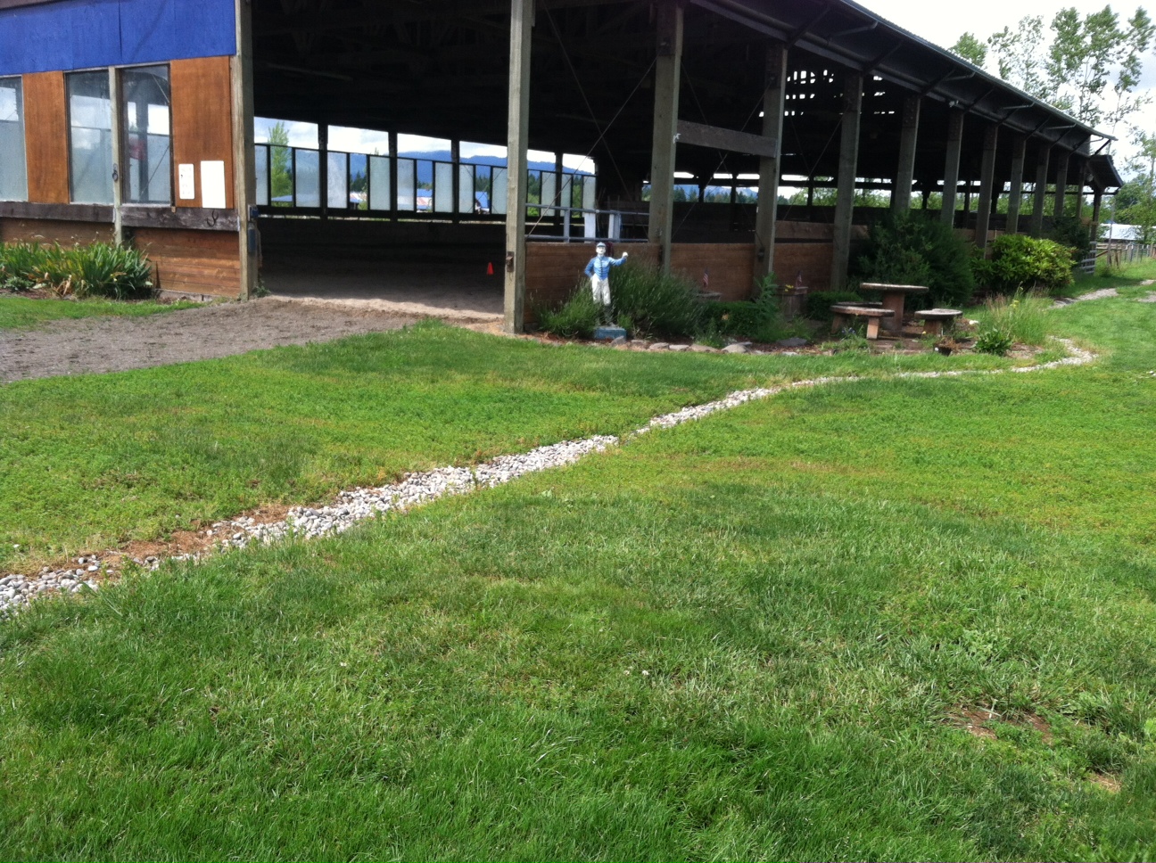 Here is an example of one of the improvements I've made. It's a drainage ditch next to the arena to remove excess rainwater.