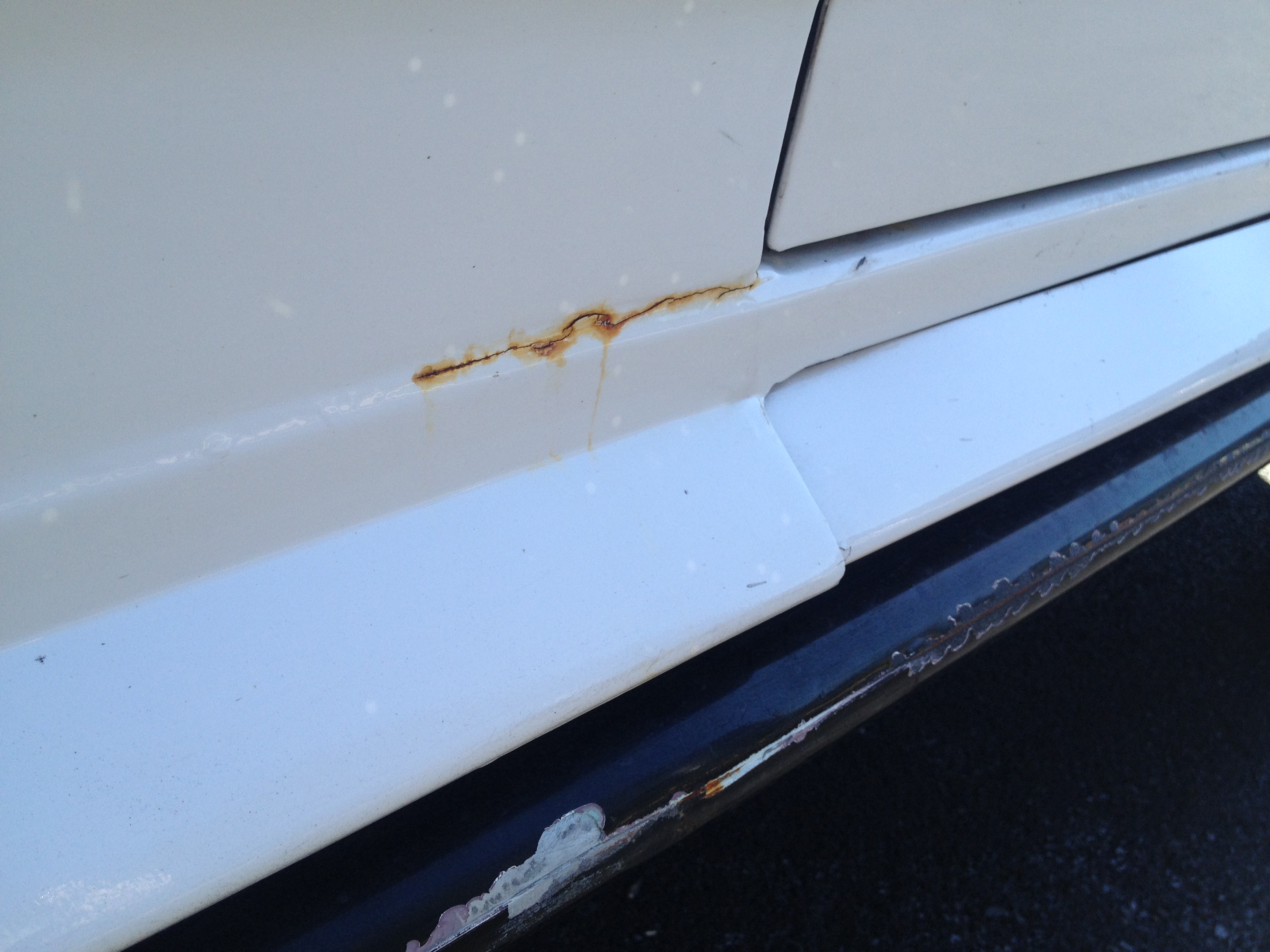 Dented Step Bars on outside and rusted....Rust All over this vehicle inside and out. Cracking paint from heat and age damage, scratches and dents from where the vehicle had run into various things in 