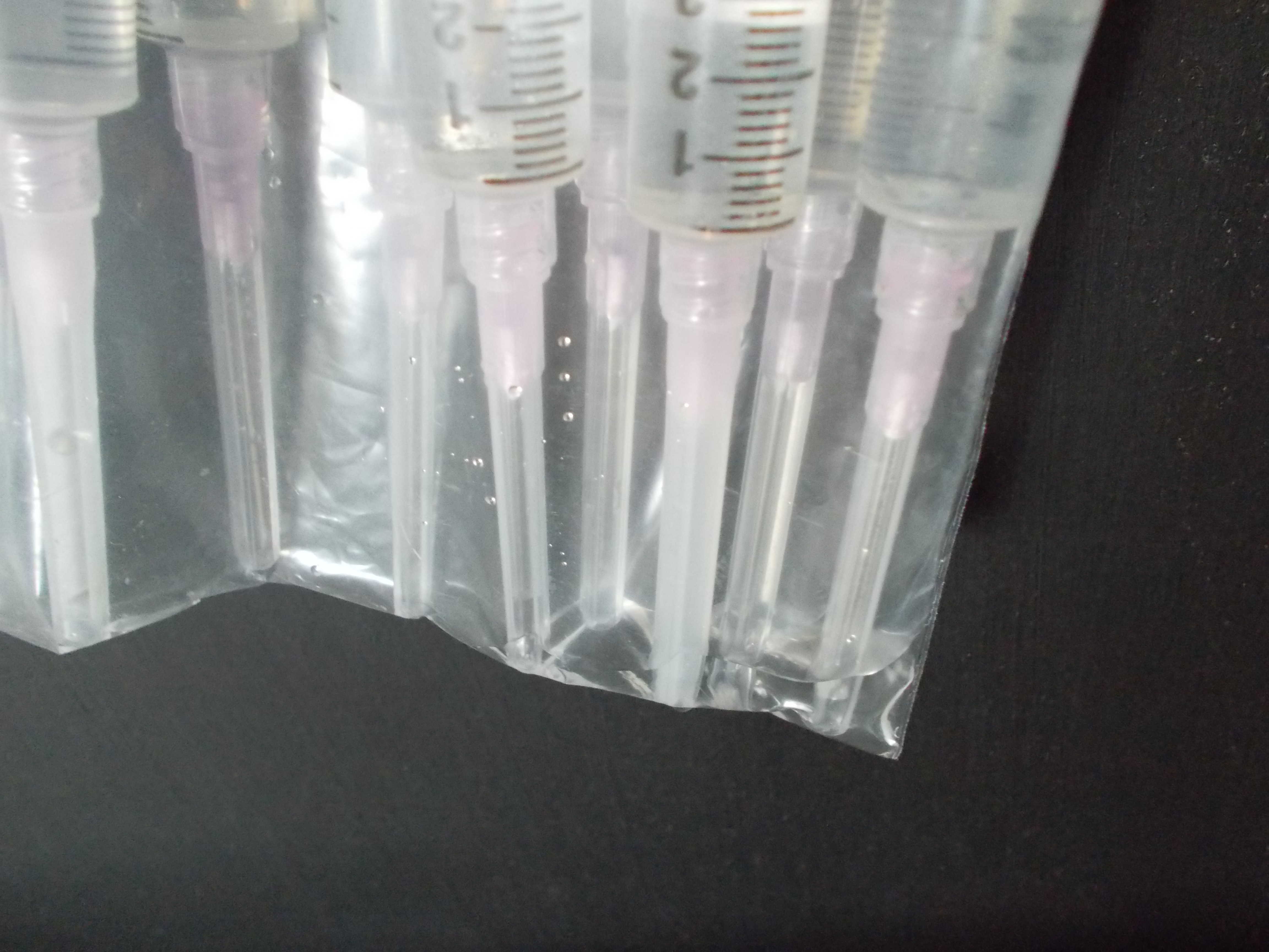 Leaking syringes in bag