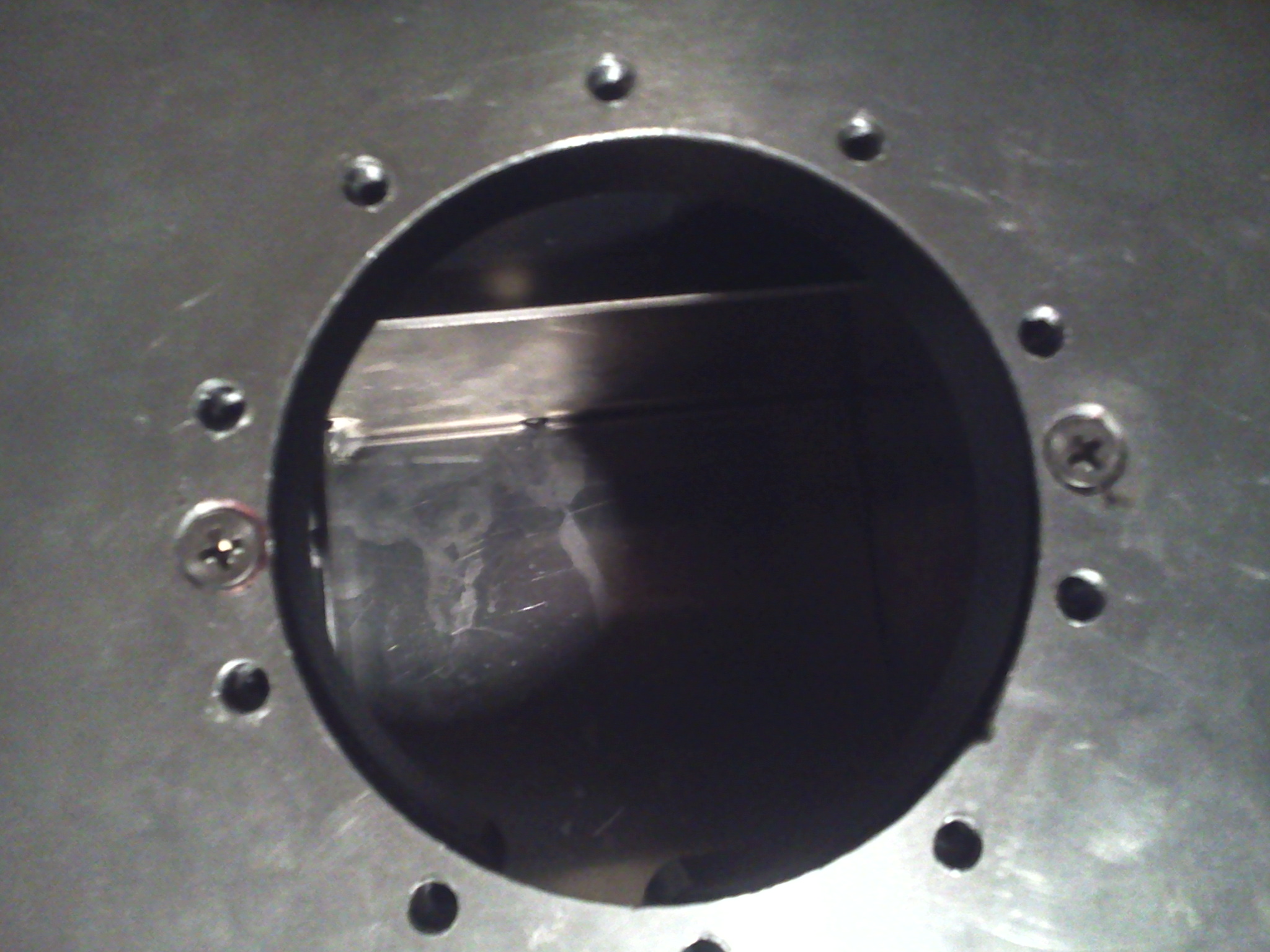 This picture shows the defective c-shaped threaded backing piece that holds the fuel pump to the fuel cell