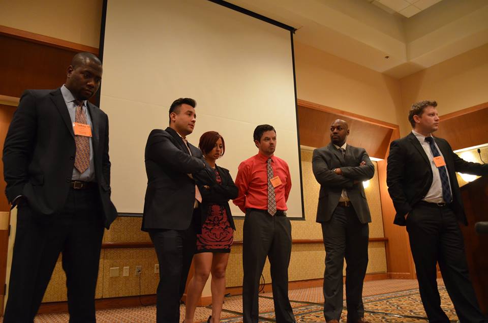 Jonathan Clarke is the man in the orange shirt in the middle. Taken at the DFW Lakes Hilton Hotel, Jan. 2014. 