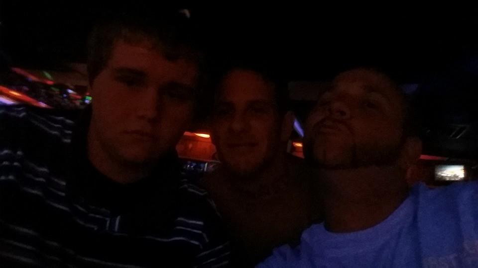 Pic in a strip club with his 15 yr old son,  high school stuident. Pic is captioned on Facebook "yea well i'm the coolest dad around...if you dont know...you better ask soommmme body"