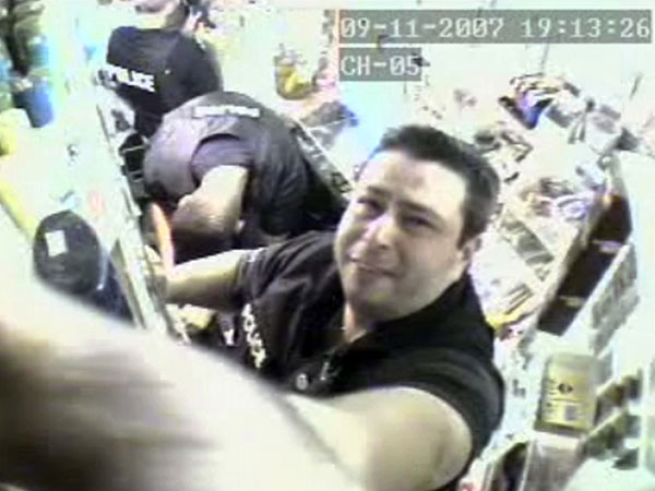 Officer Thomas Tolstoy caught on video disabling and vandalizing cameras