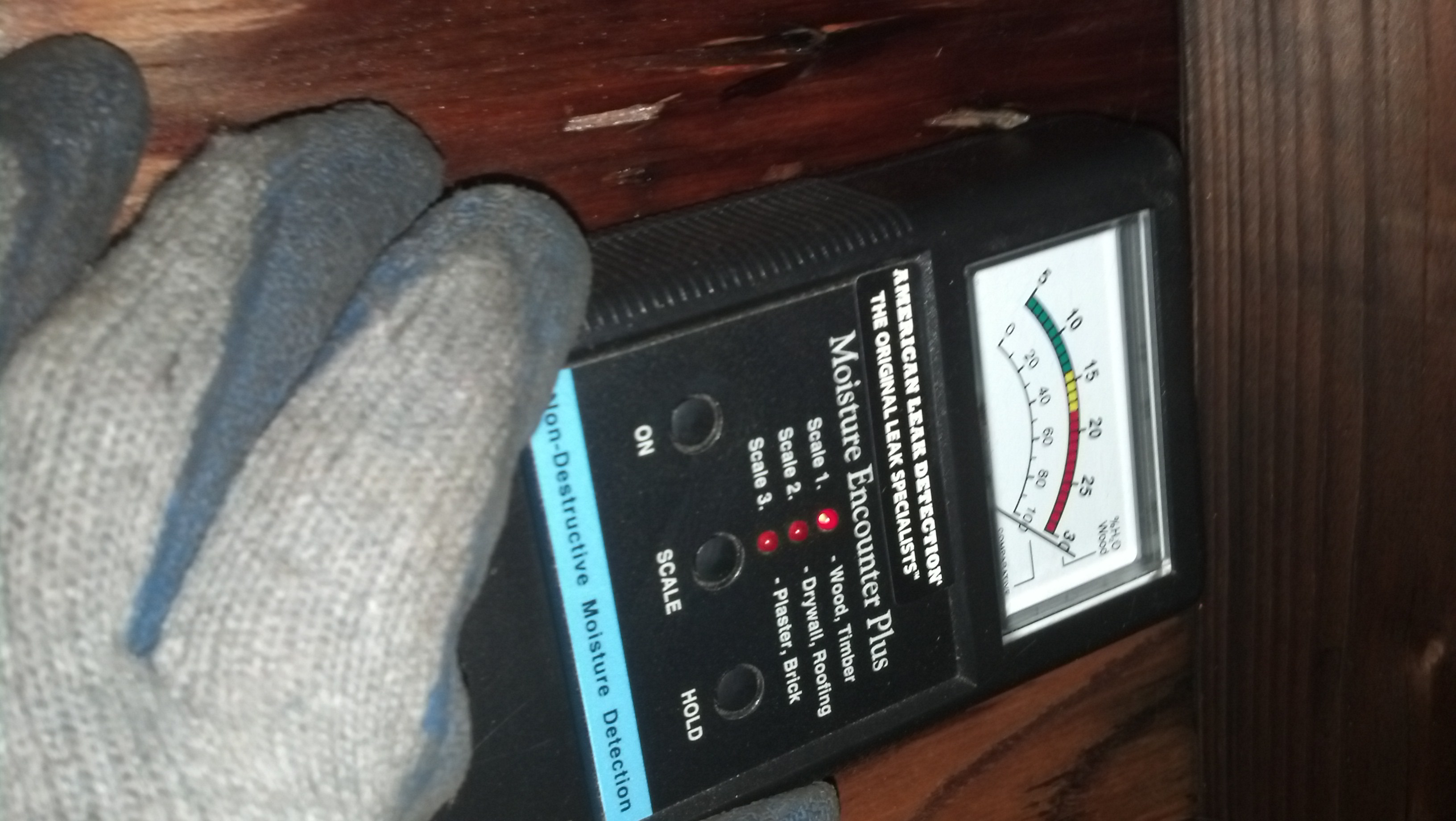 Moisture Meter Off the Charts with Moisture from Roof Leak