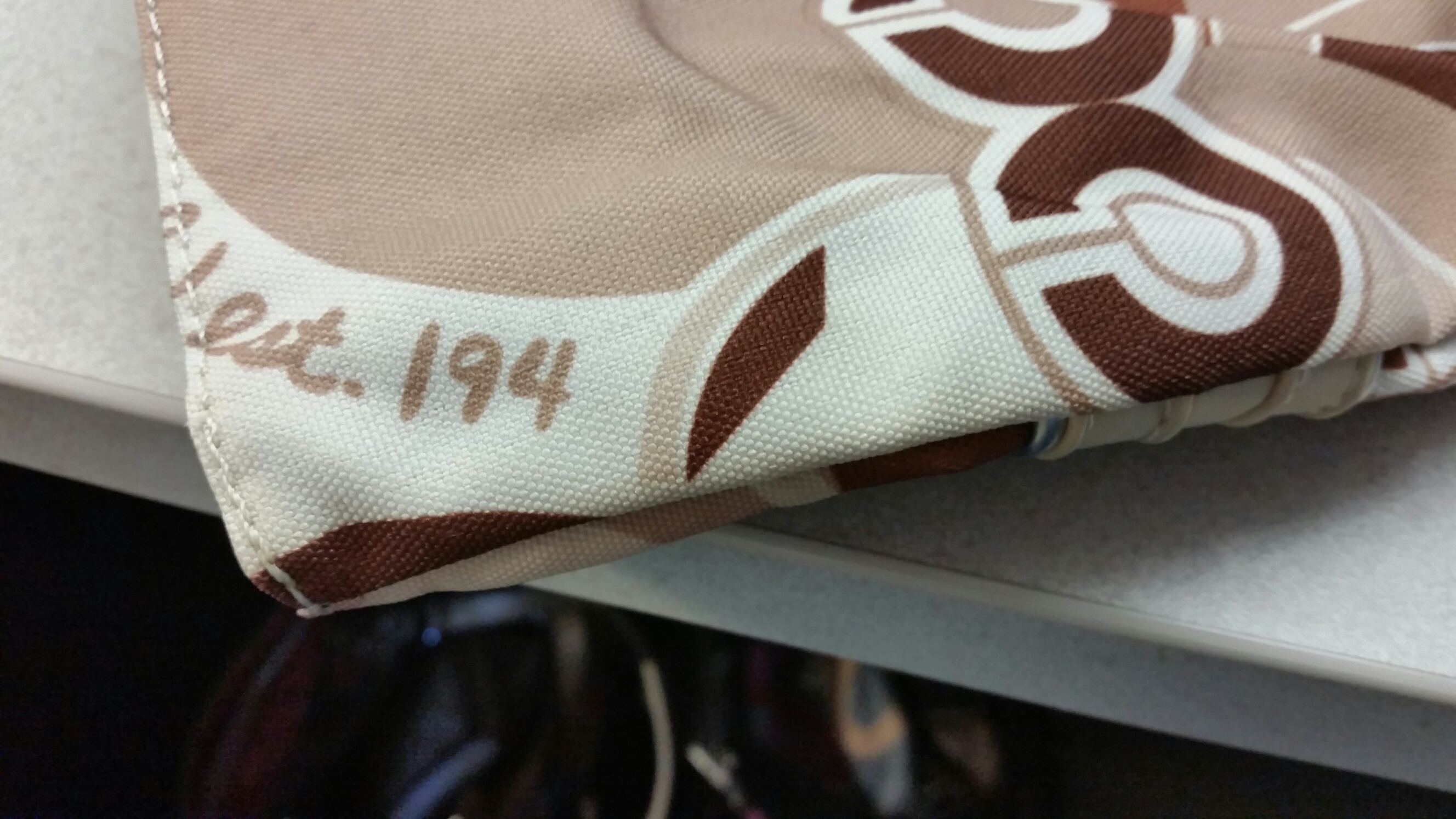 Fake bag 2, couldn't even try to hide the fact it's fake by completing the "1941" stamping on the fabric