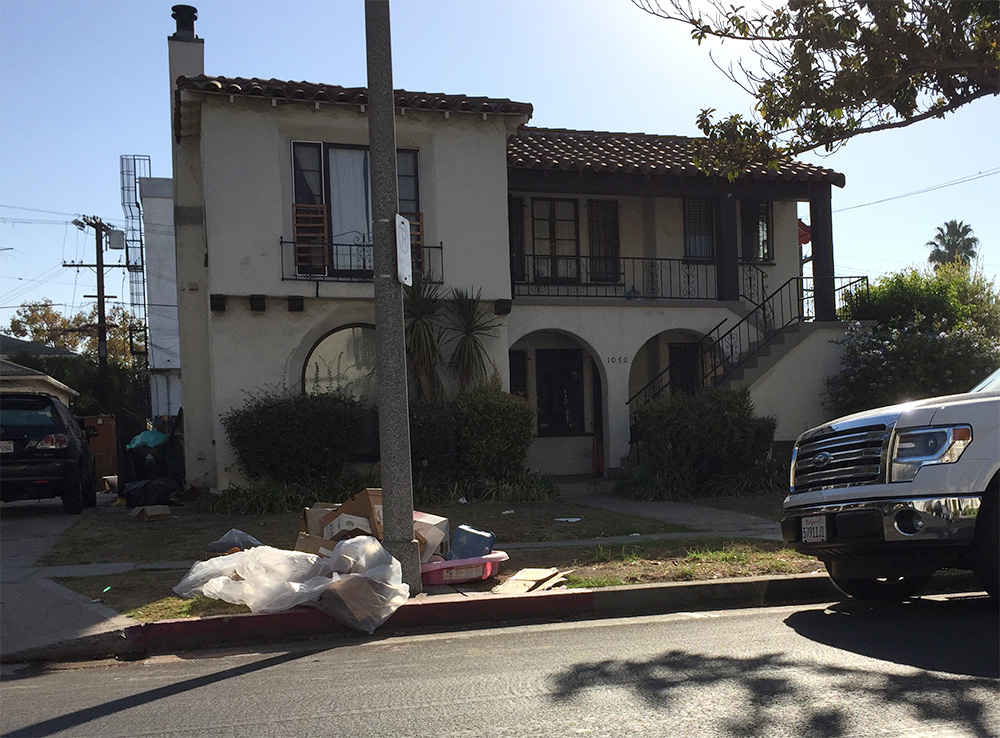 trash left in front of house. 1 of several incidents.