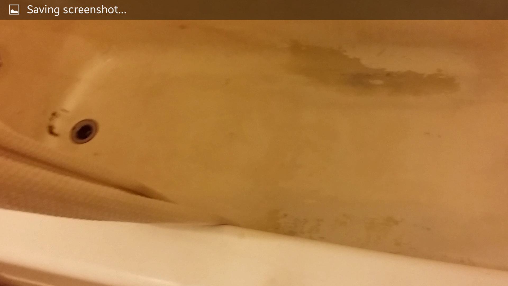 Black Mold and Rust in Bathtub