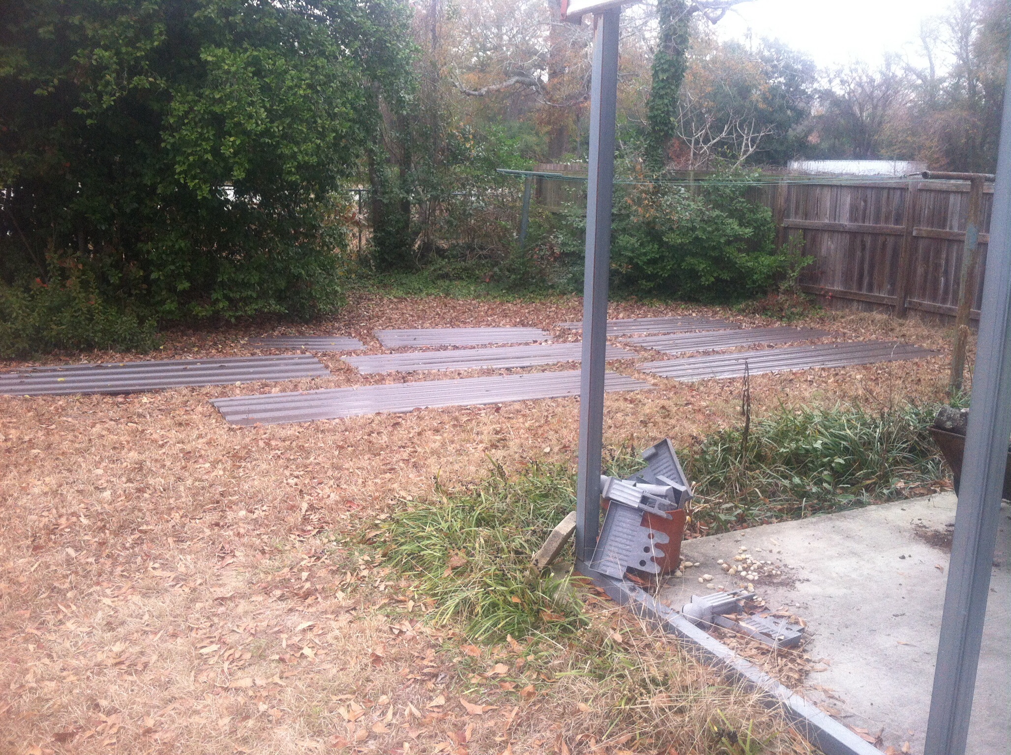 More roofing material in the backyard. For 2 months glad it was dormant grass or I would have had a very dead lawn.