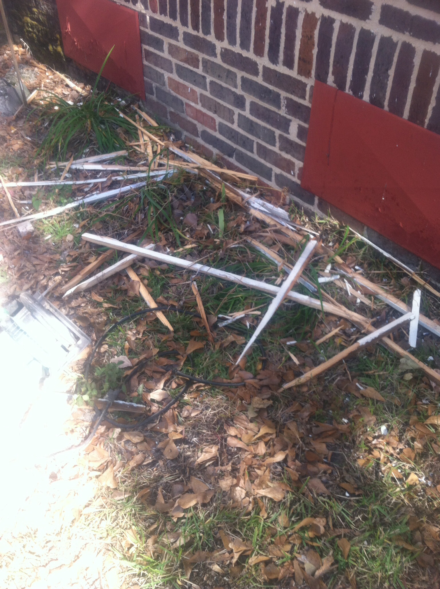 More trash and debris no tarp to catch any of it. Glass nails and wood splitters.