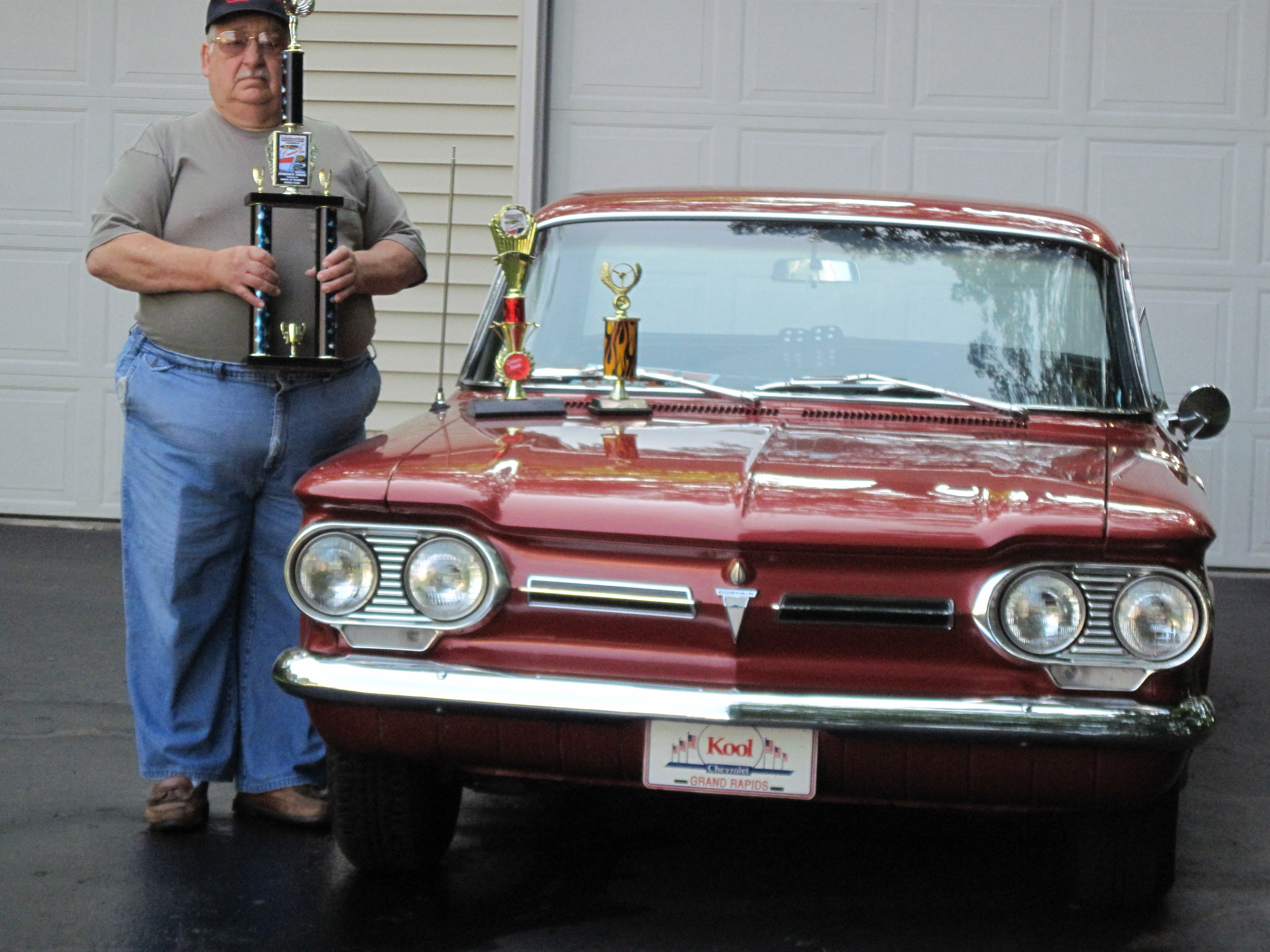 car with trophies