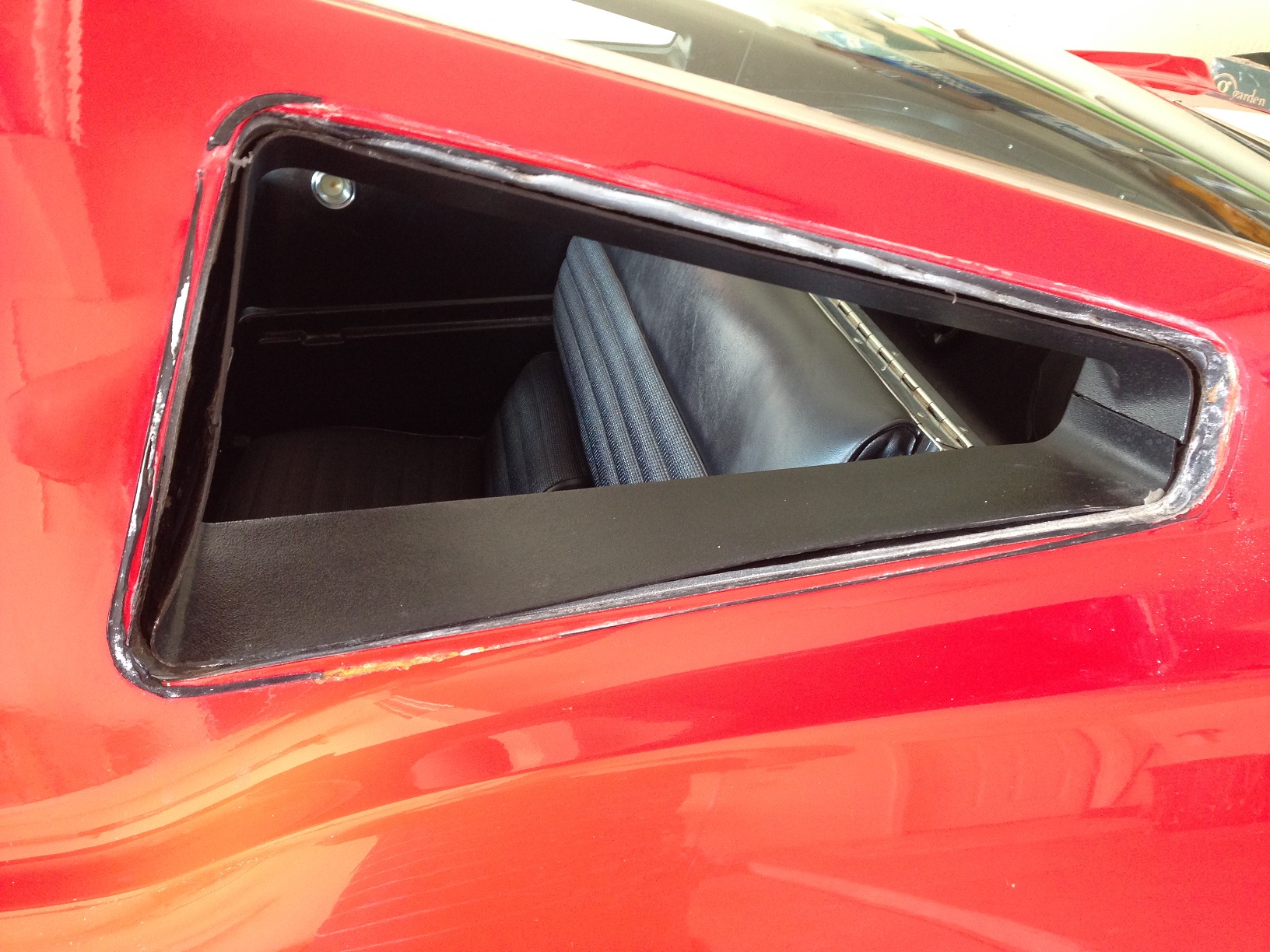 Rear driver's side window