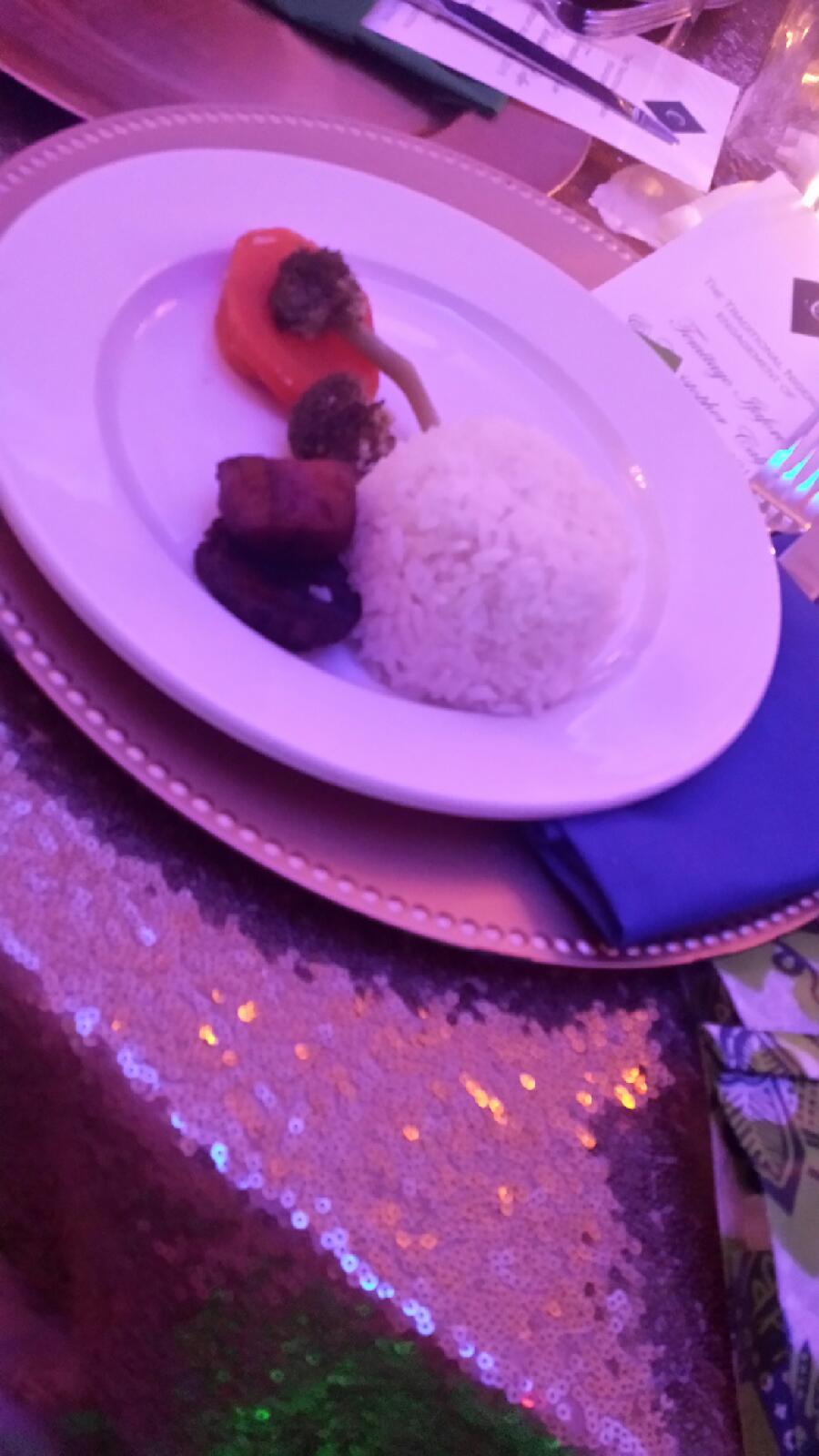 The 'vegetarian plate" served to a guest. Two broccoli, one carrot, two slice of plantain.