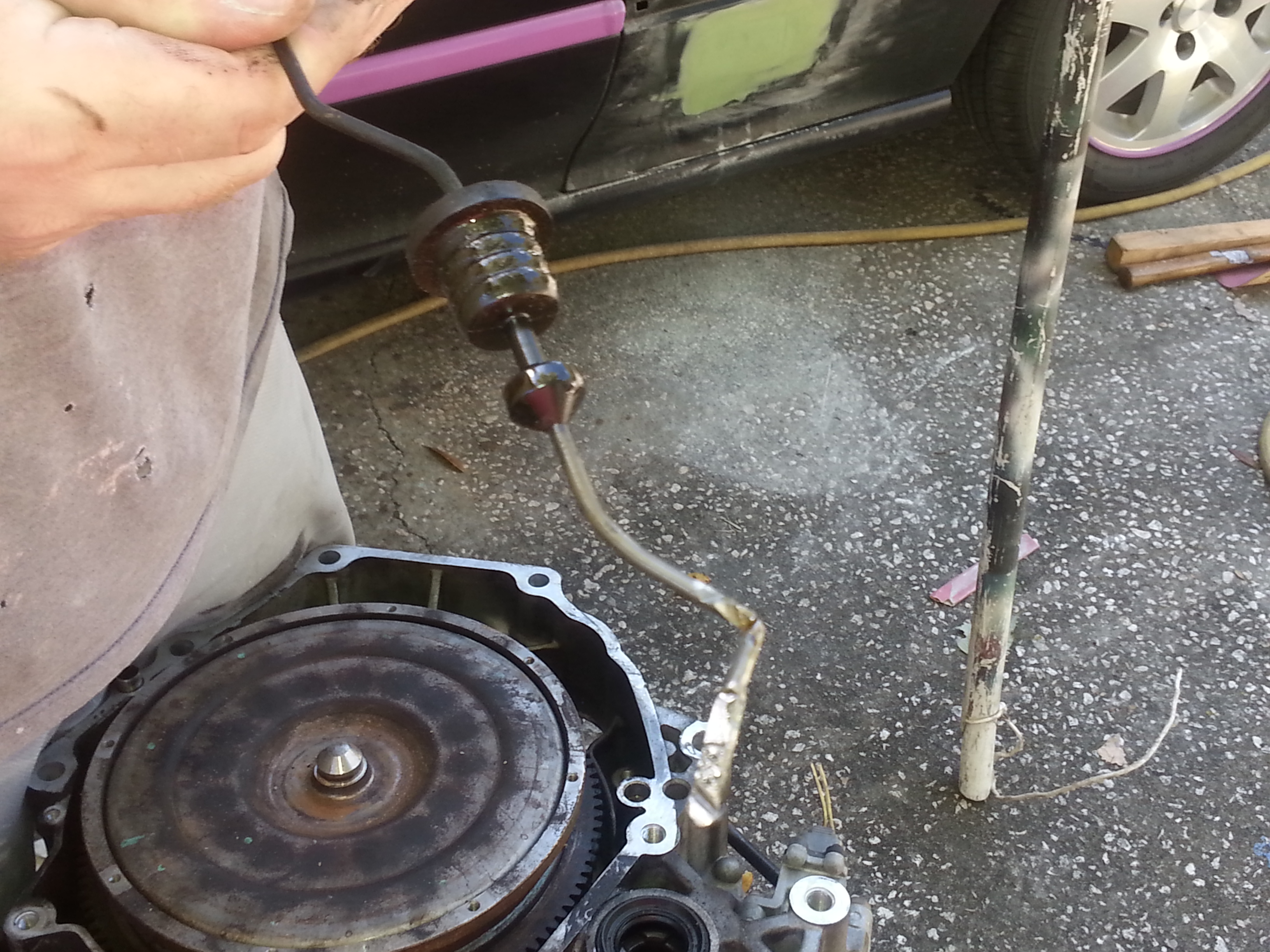 This shows how bent the dipstick on the transmission was compared to a normal one