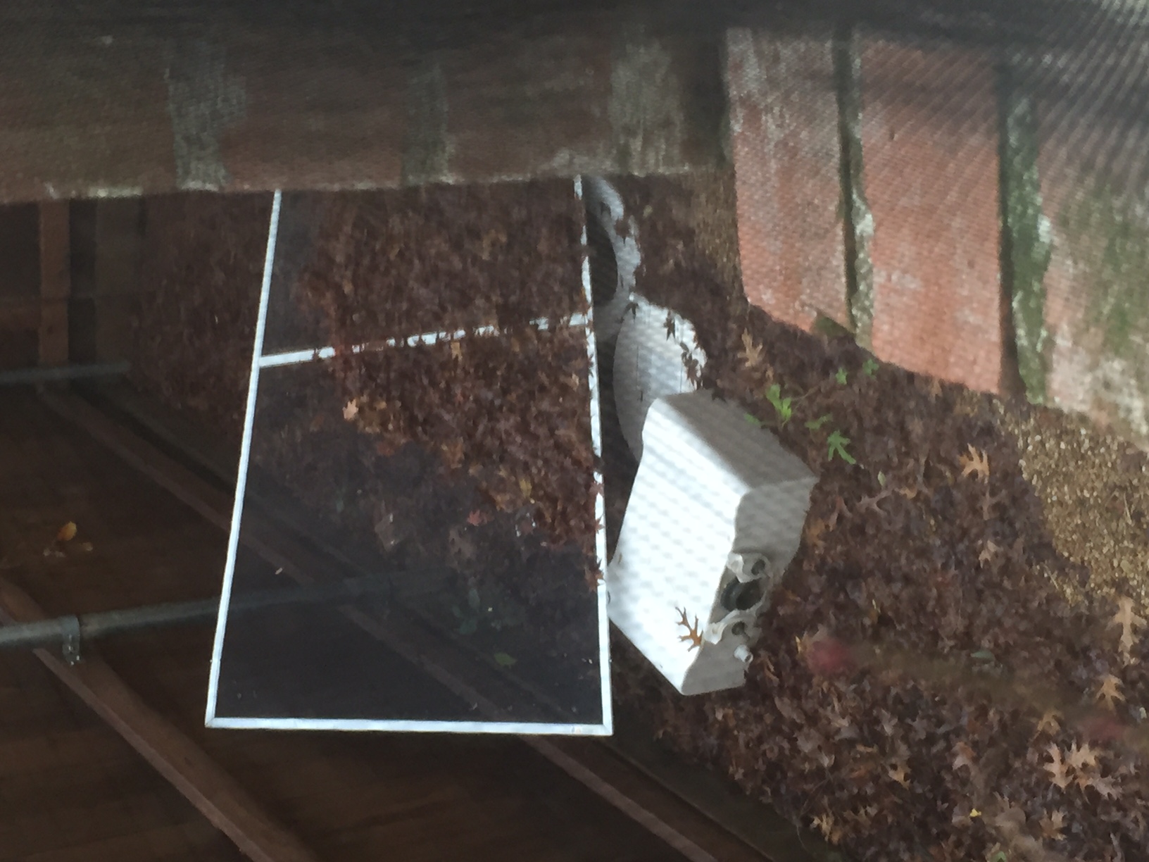 Toilet pushed out of a bathroom during construction just left on the side of the house. Also left about 6 ladders and the iron scrap from the carport/deck.