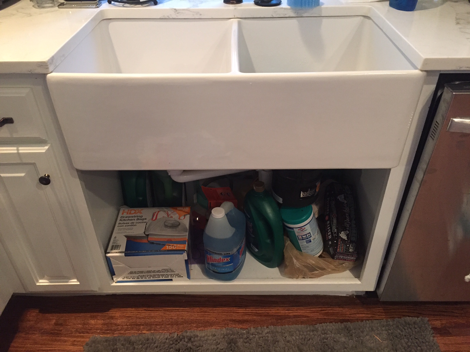 Never reattached the cabinets below the sink after installing the new sink.