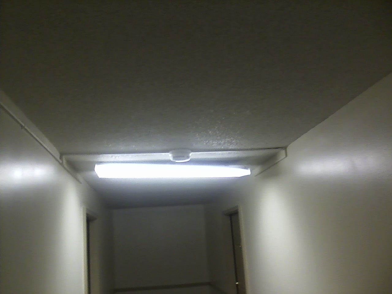 Broken light fixtures in the hallways.