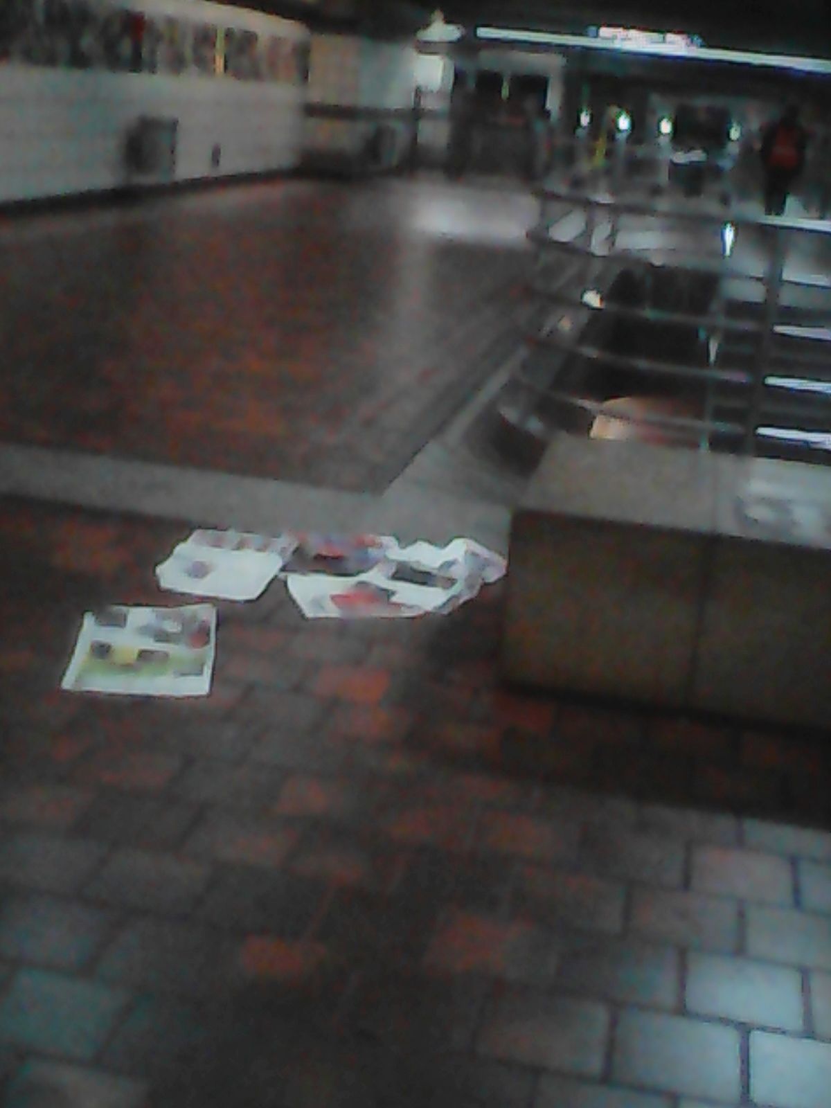 the news paper someone place over the water after they couldn't find Metro worker to clean up