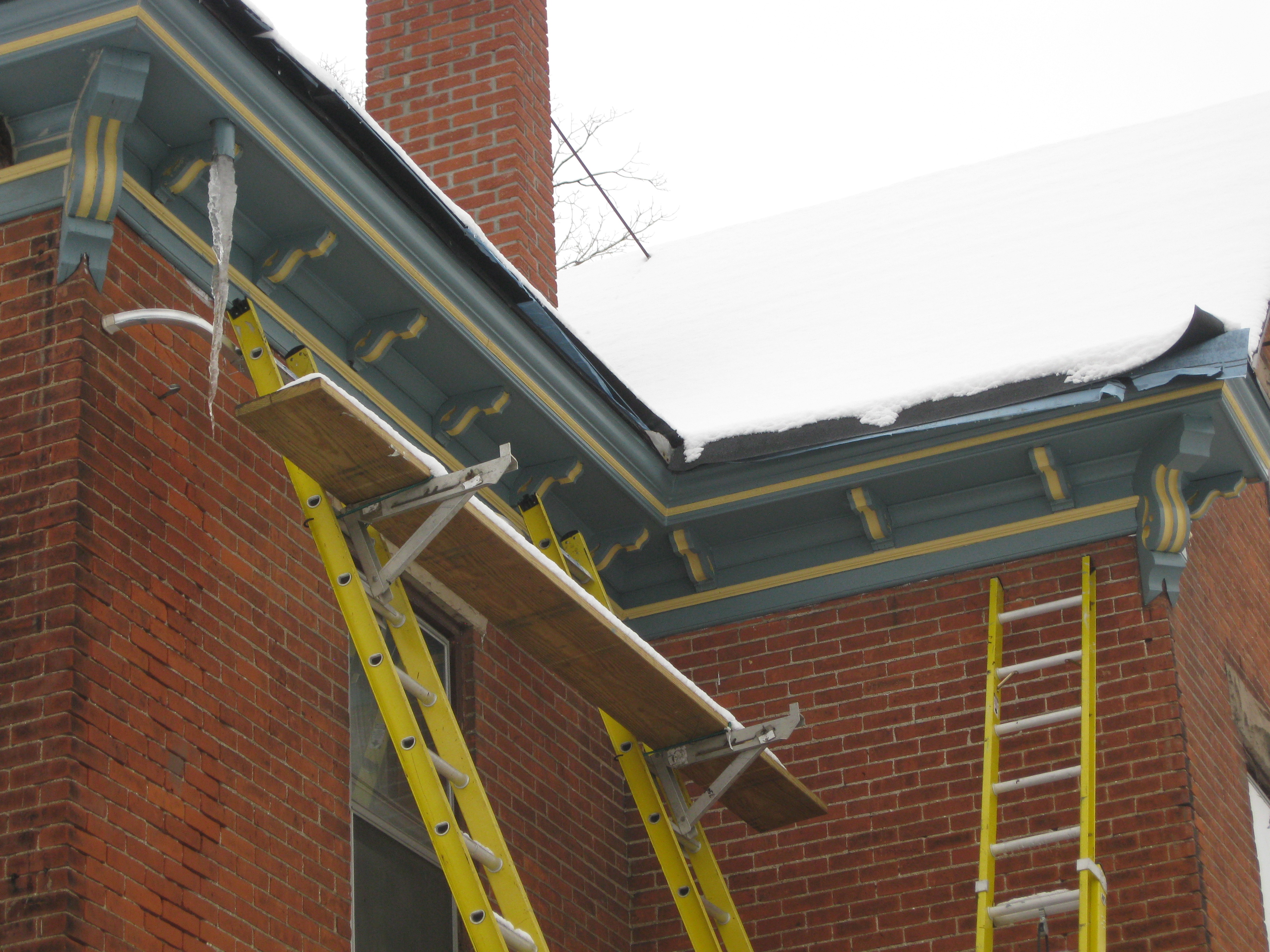 They left these ladders up from the end of December until the middle of March. They would not pass OSHA's regulations. We saw them everyday coming home from work, reminding us daily of the hell we wer