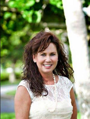 Vickie McCord of Irongate Realty in a seriously airbrushed photo.