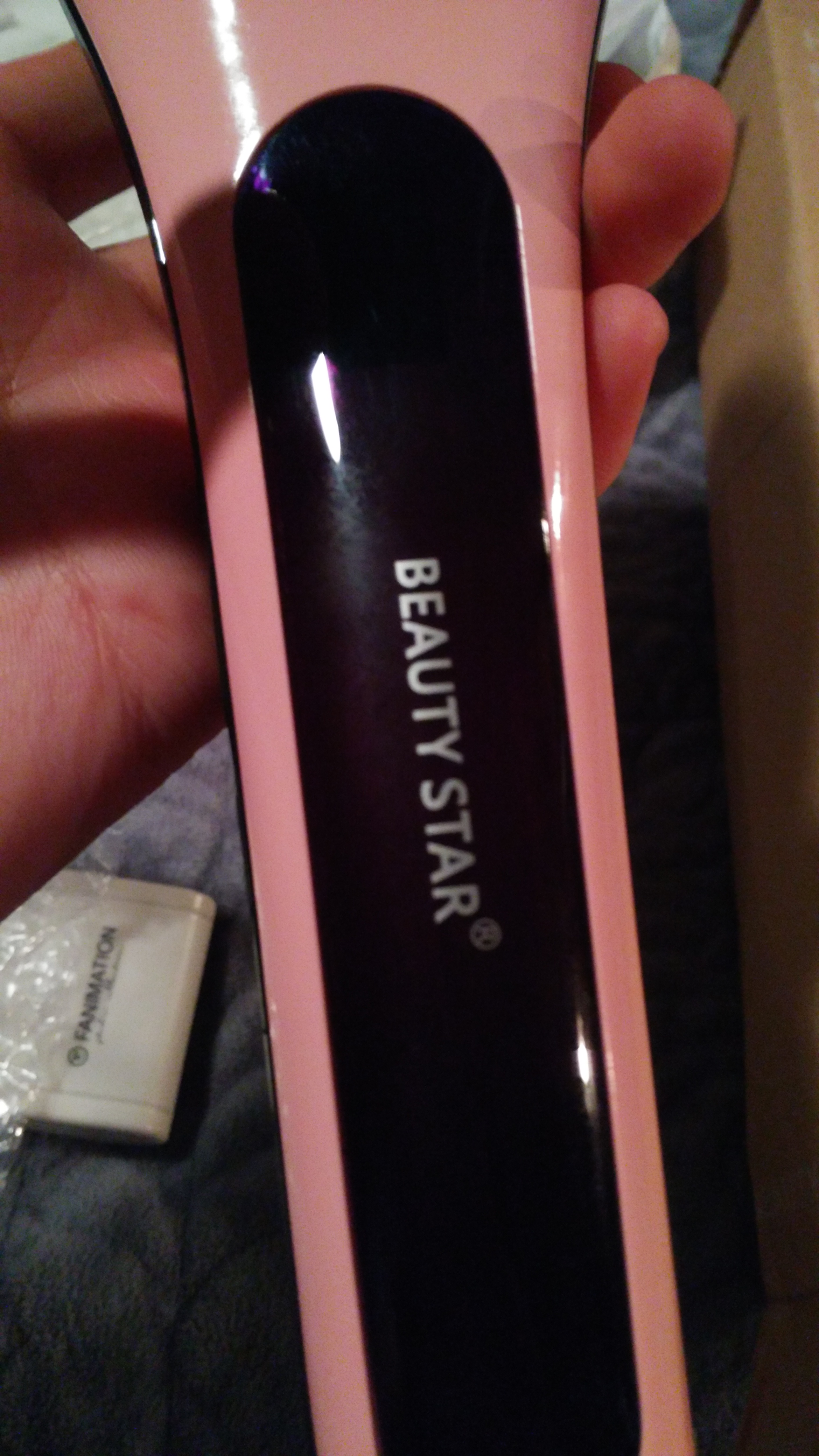 Beauty Star label on brush. At straightfix.com, this label does not appear on any of the images of the product, nor is the name Beauty Star ever mentioned.