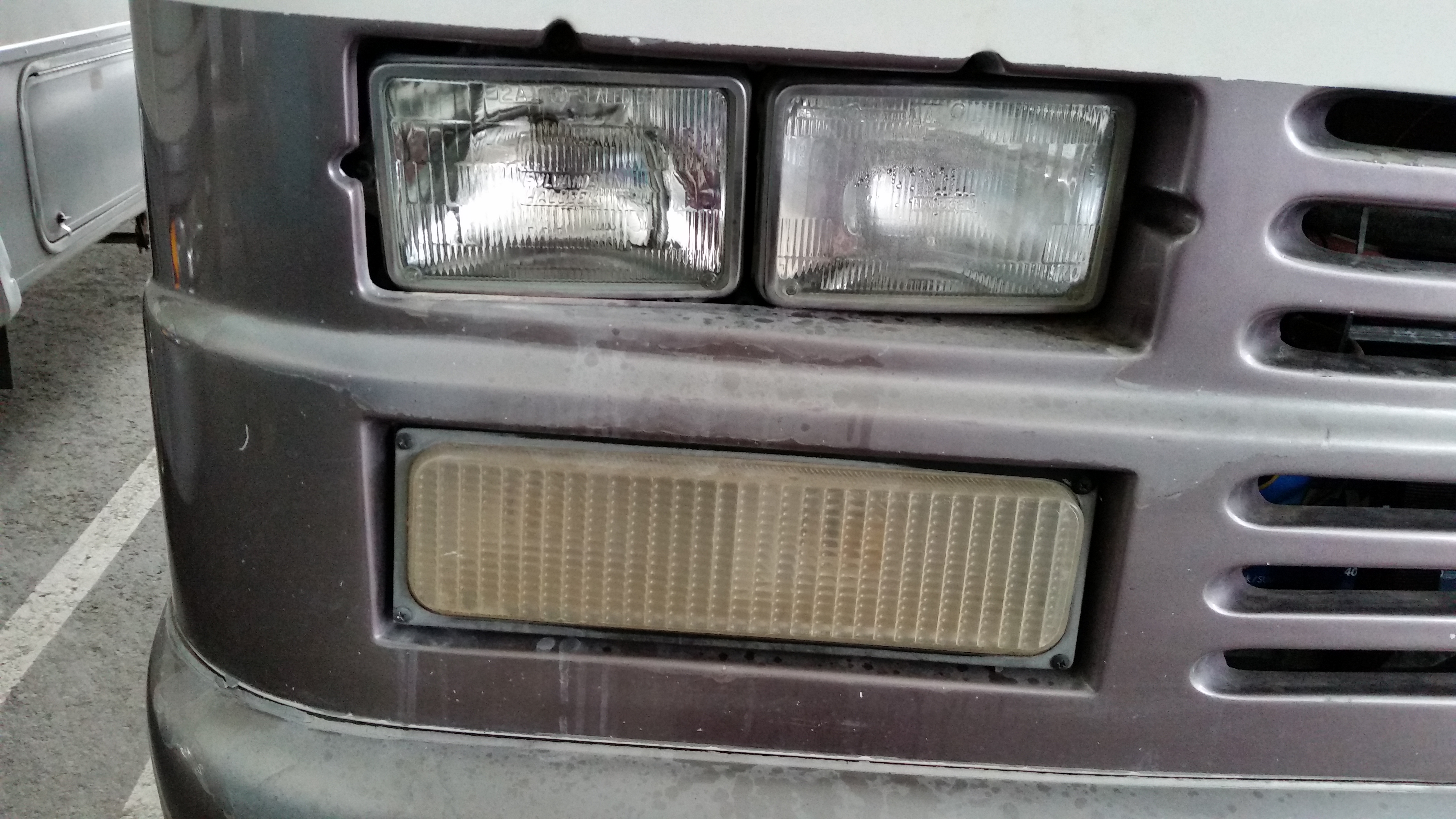 Headlamps have no housings.   Lamps moving when I drove short distance at night.