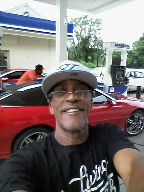 "Here's a recent picture of myself and I'm 55 that's my red hot rod that I restored it's my hobby. So you know who you're meeting with"

That is what he texted as he sent this photo to me. Mind you, t