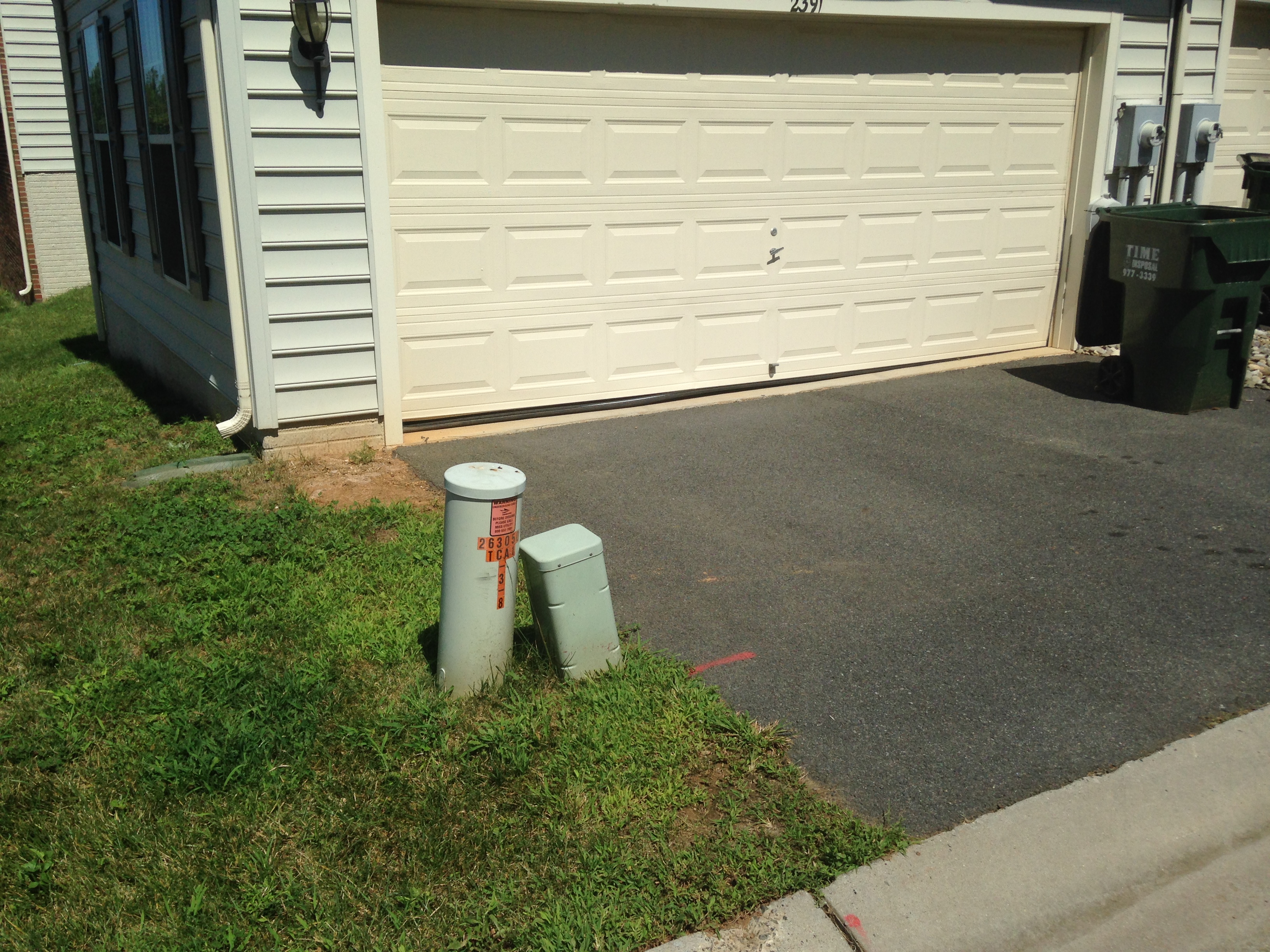 Damage to the garage door.