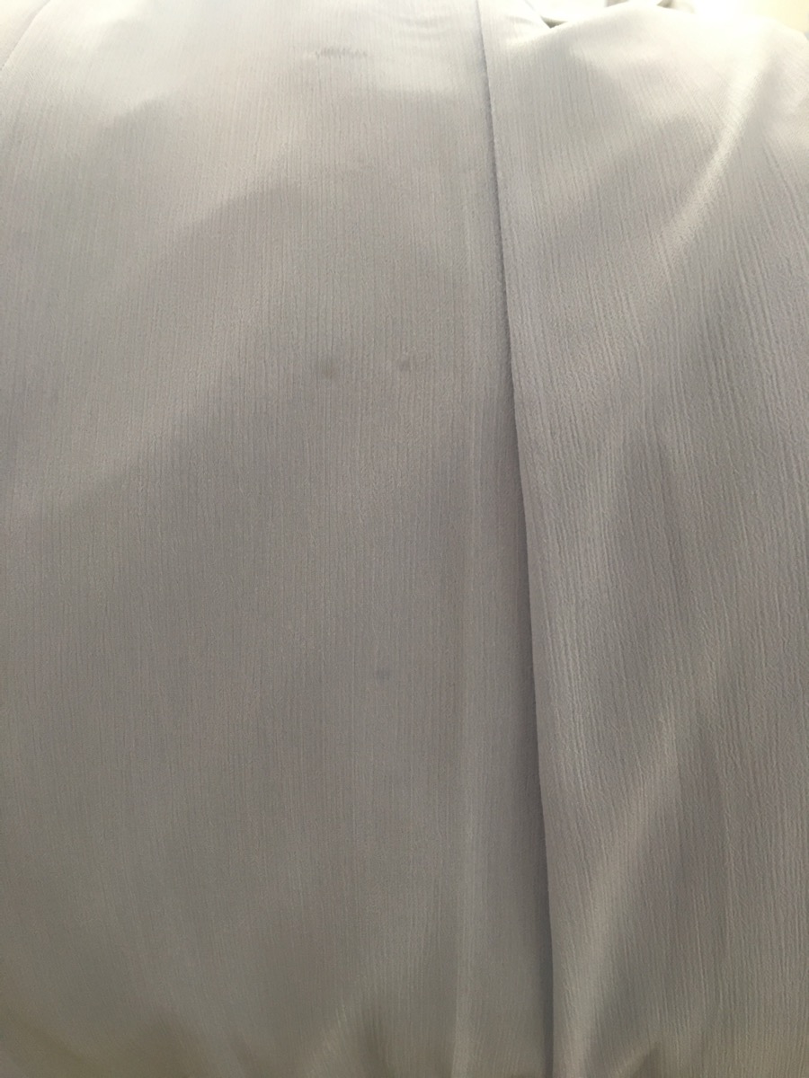 Stains on "Brand New" dress after waiting 4 months for it to be made. 