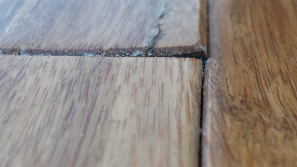 Bamboo Floor Damaged, Glued, Poorly Fitted