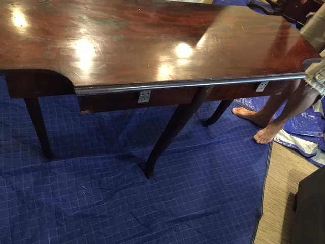 Large entry table - wing ripped off.