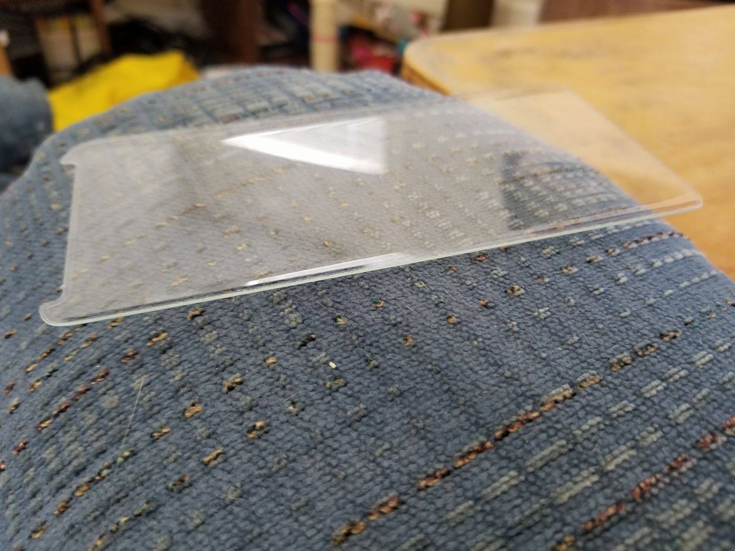 Look closely to see tiny, fine line of adhesive around the edge.