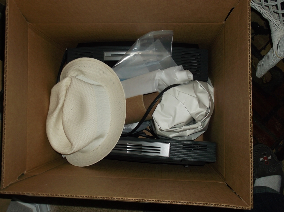 $70 hat ruined by BOSE machine with no wrapping or padding of any kind.  Machine improperly placed in box.