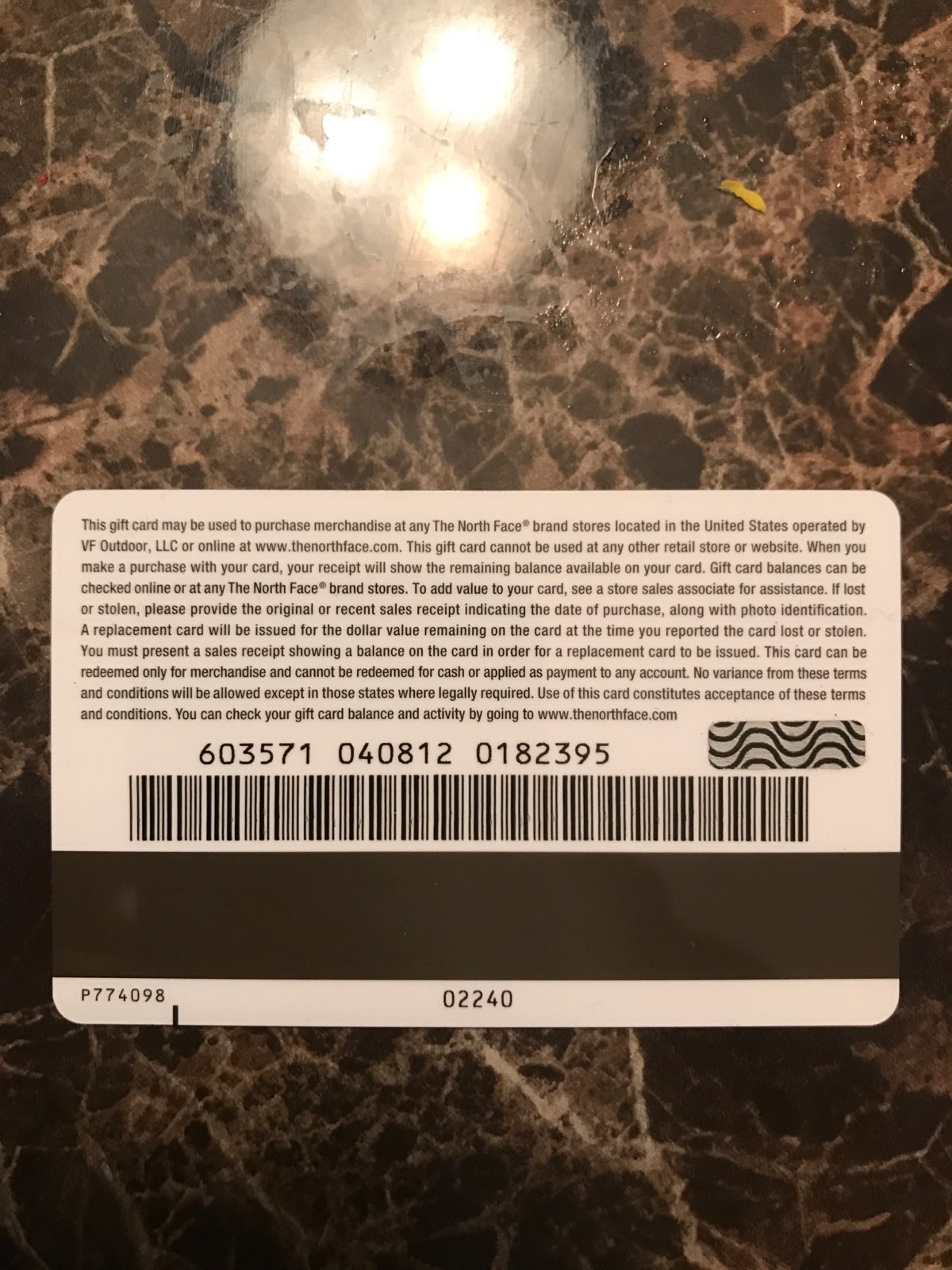 The back of the card where the rules are stated
