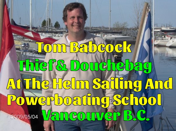 Tom Babcock At The Helm Sailing And Powerboating