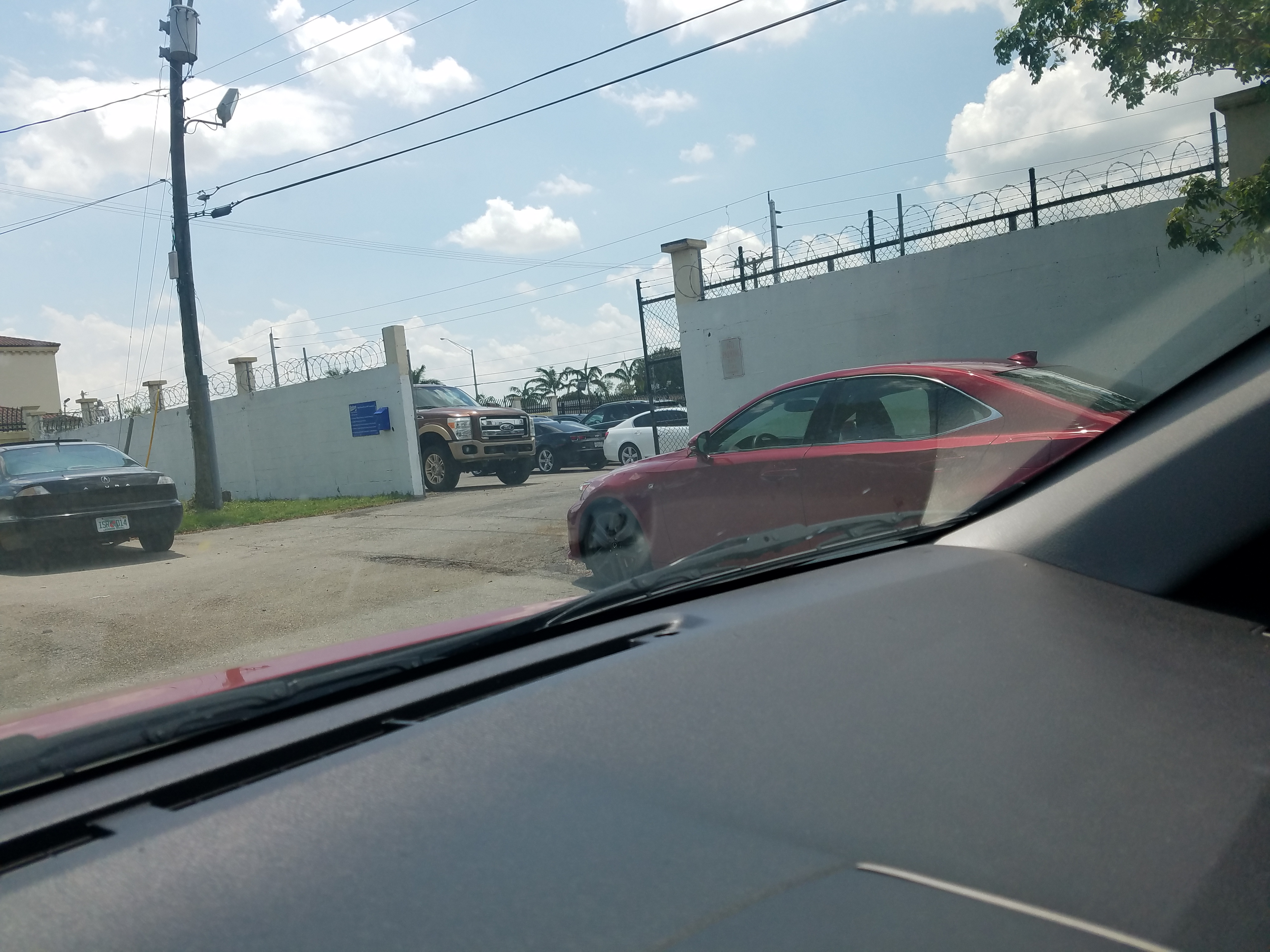 picture of rear of dealership where they park cars