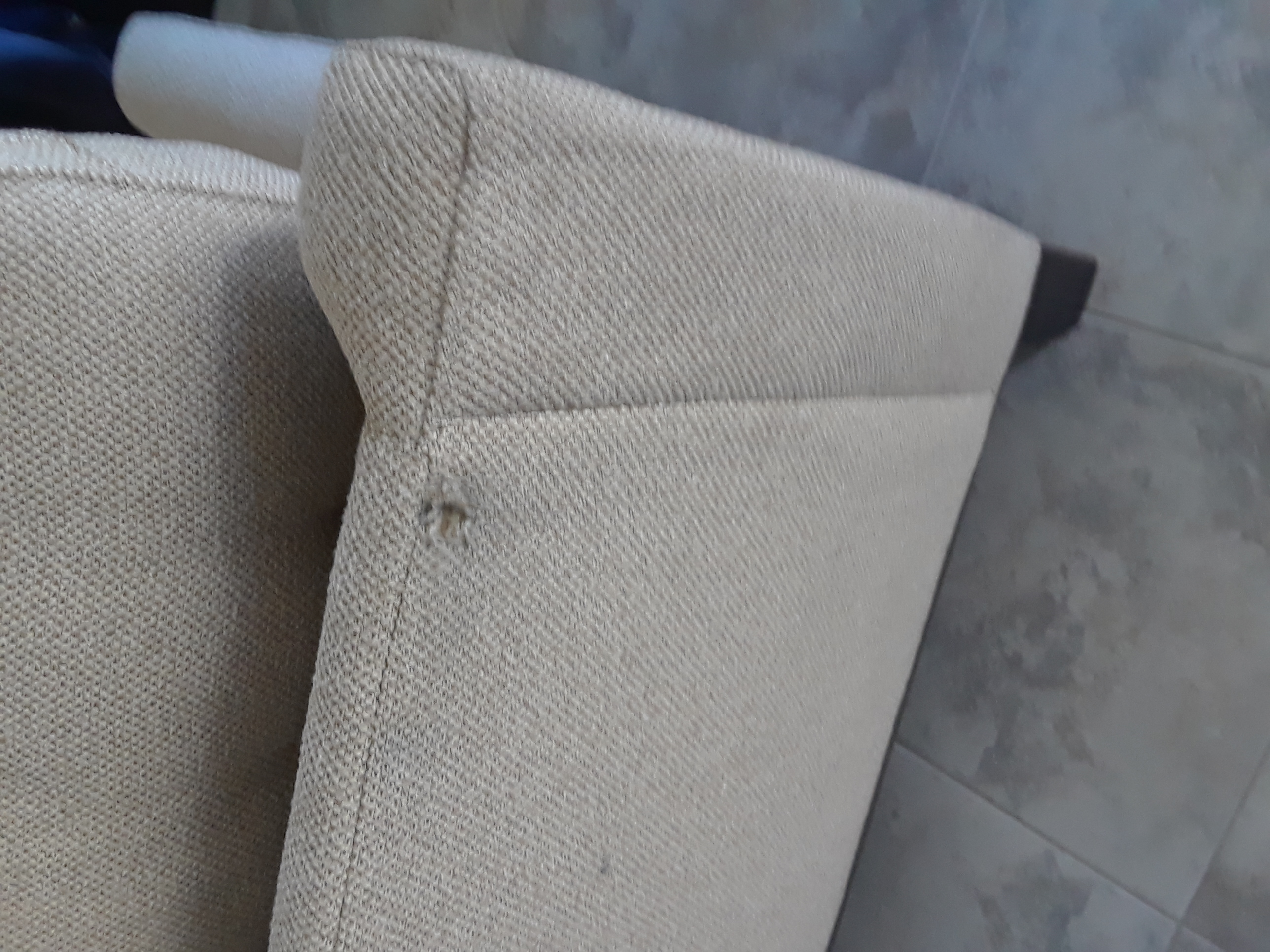 Close up of damage to couch
