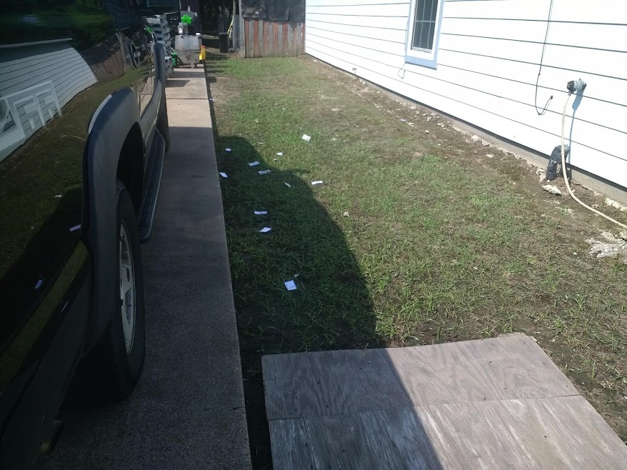 Contractor threw business cards in the yard