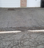 Streets and driveways are falling apart. 