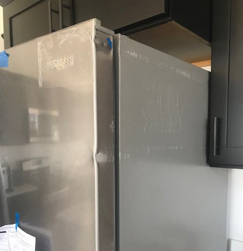 Damaged brand-new refrigerator