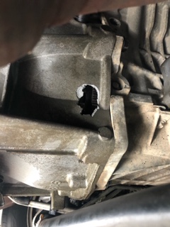 hole left from bolt dropped inside transmission