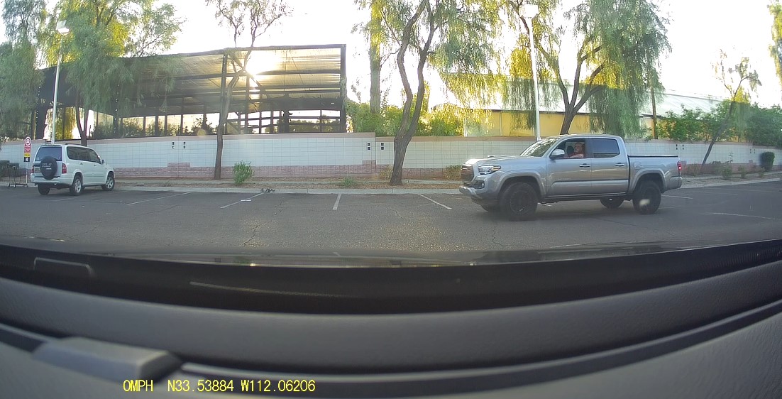 Russ Downs parking next to me, empty parking lot.