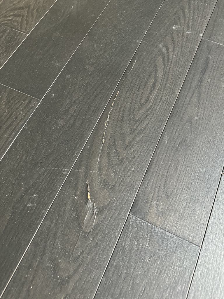 Damaged “new” wood floors 